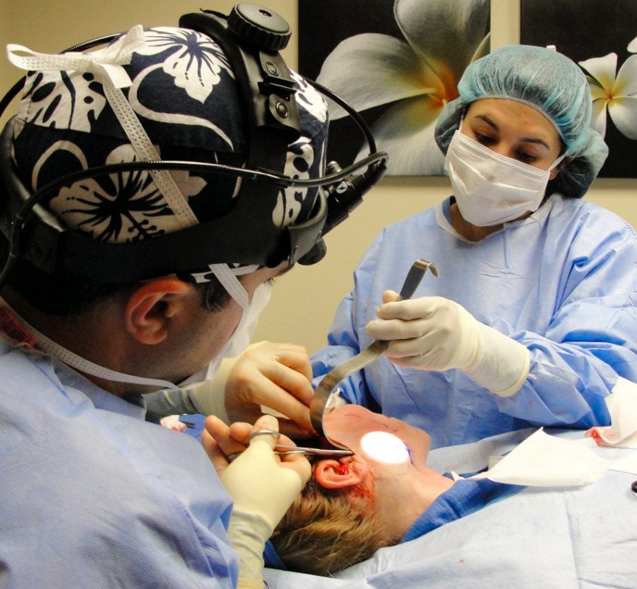 Plastic surgeons working